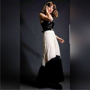 Cream and Black color block maxi skirt with metallic sheer overlay .